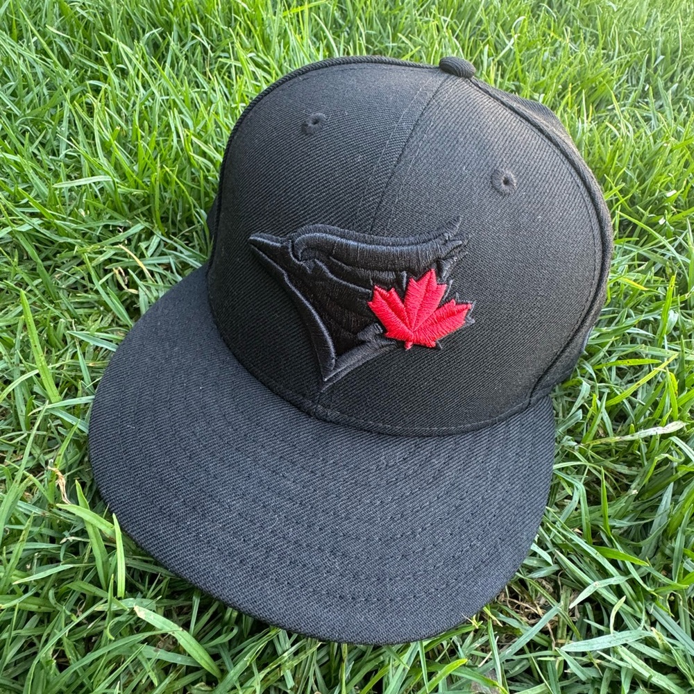 New Era Black "Toronto Blue Jays" cap. 7 1/8”